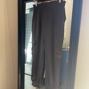 Size small silk like (polyester) cargo/jogger pants.  Great condition.